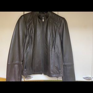 Brand new still has tags!!! Women’s black leather jacket